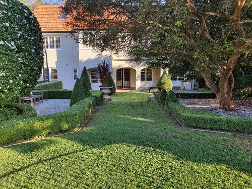 Greenway Gardens house with green path